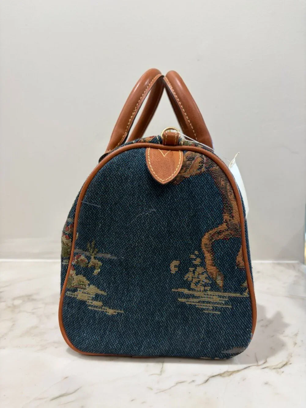 Denim and leather handbag with Southwestern Design